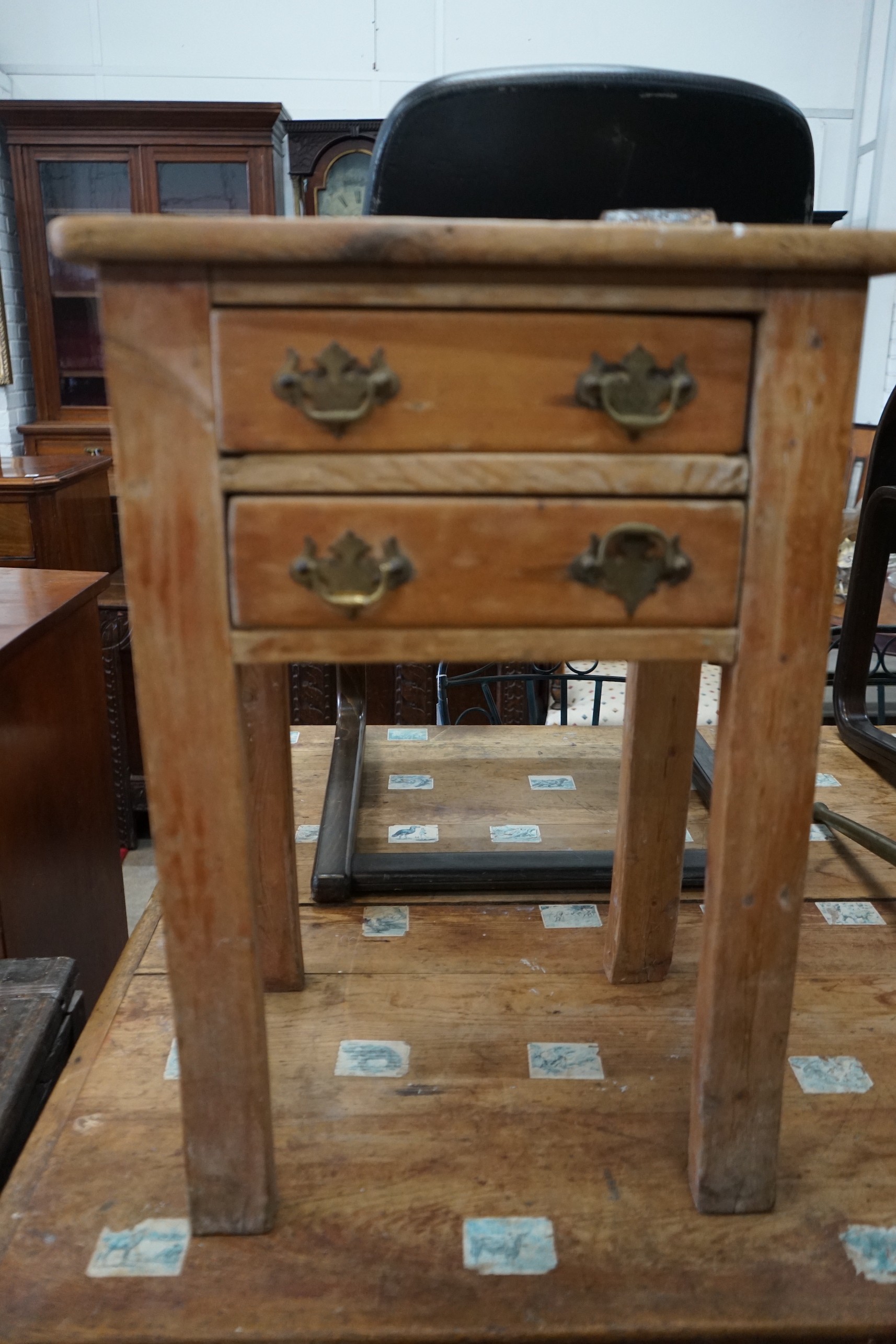 A Victorian pine two drawer book press table, width 50cm, depth 36cm, height 71cm